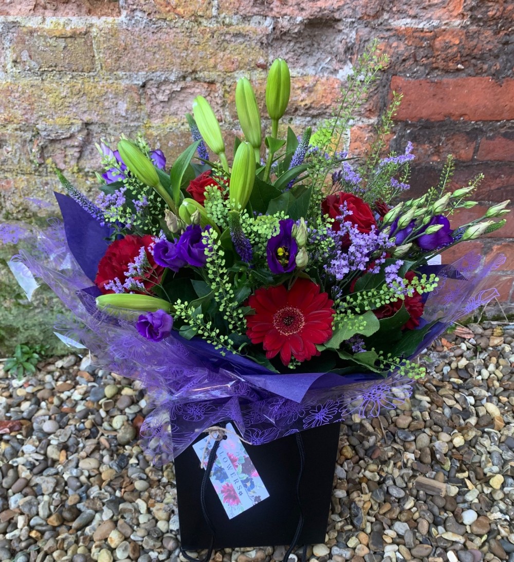 Bespoke Hand Tied Aqua in Reds and Purples