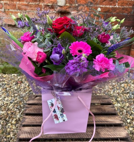 Bespoke Aqua in pinks, purples with single Red Rose
