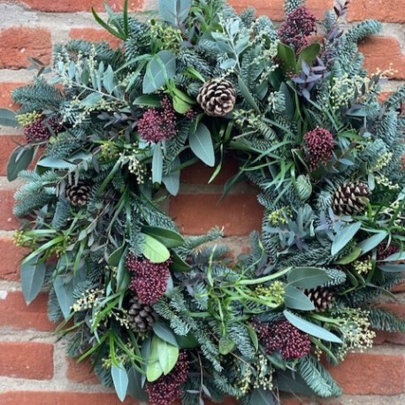 Foliaged Fresh Christmas Door Wreah